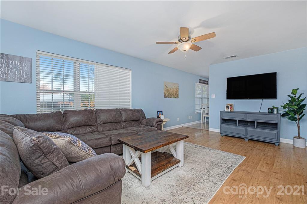 6107 Stack Road Monroe, NC 28112 - Photo 13 of 24 a living room with furniture and a flat screen tv