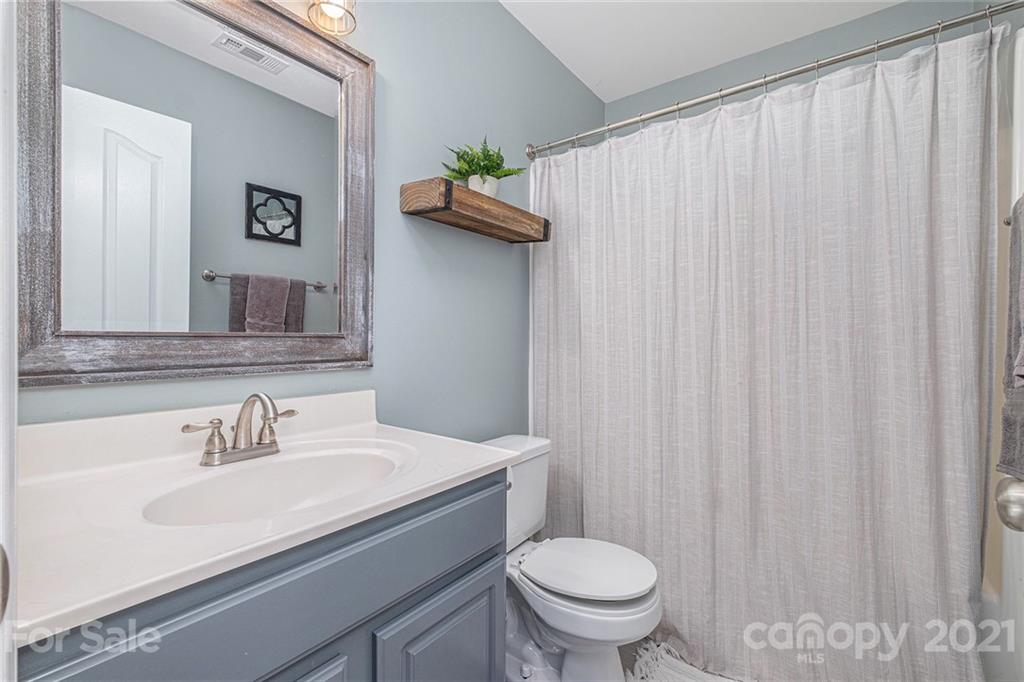 6107 Stack Road Monroe, NC 28112 - Photo 18 of 24 a bathroom with a sink and a toilet