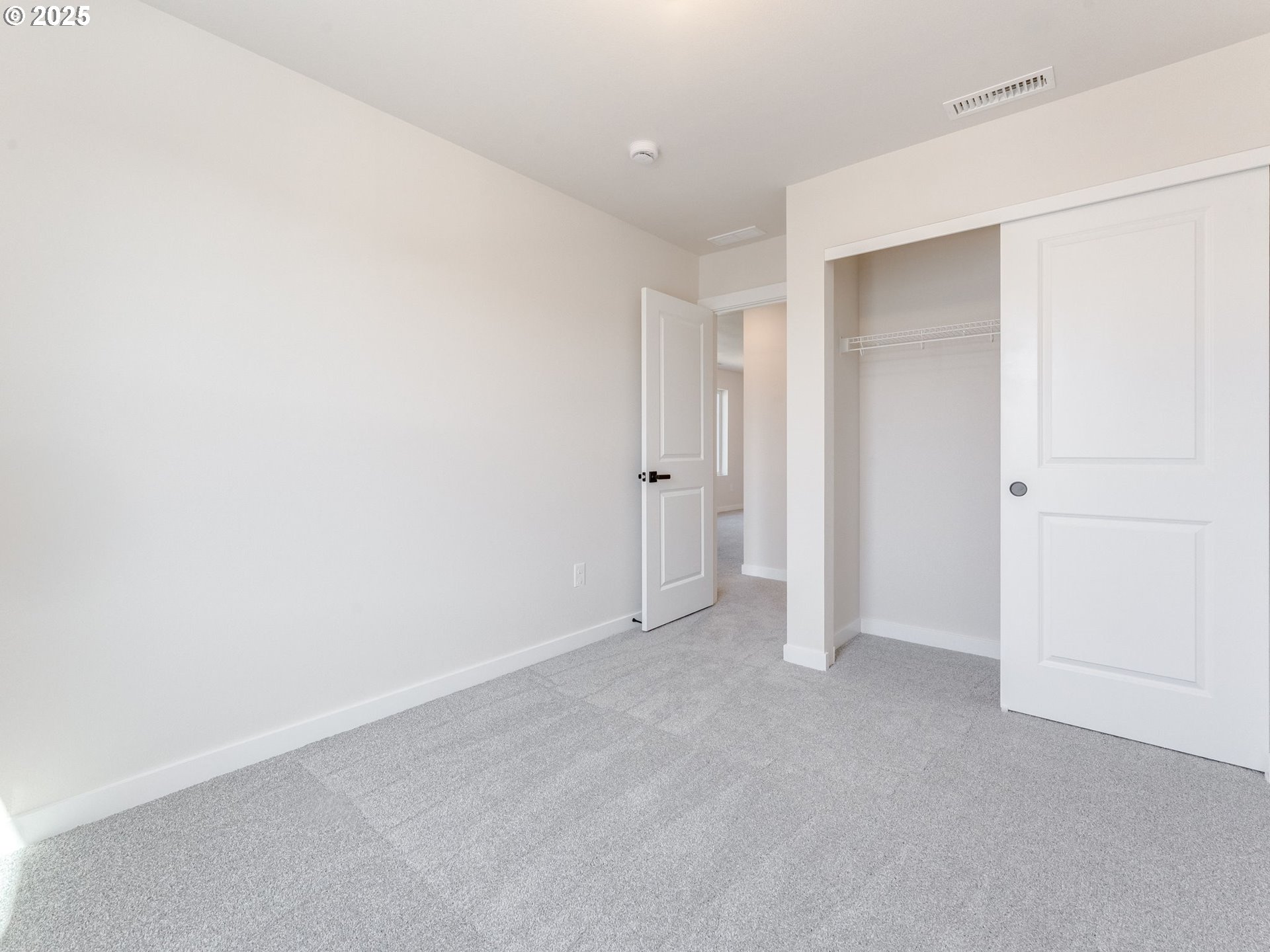 744 Northwest 178th Street Ridgefield, WA 98642 - Photo 14 of 25 an empty room with closet area