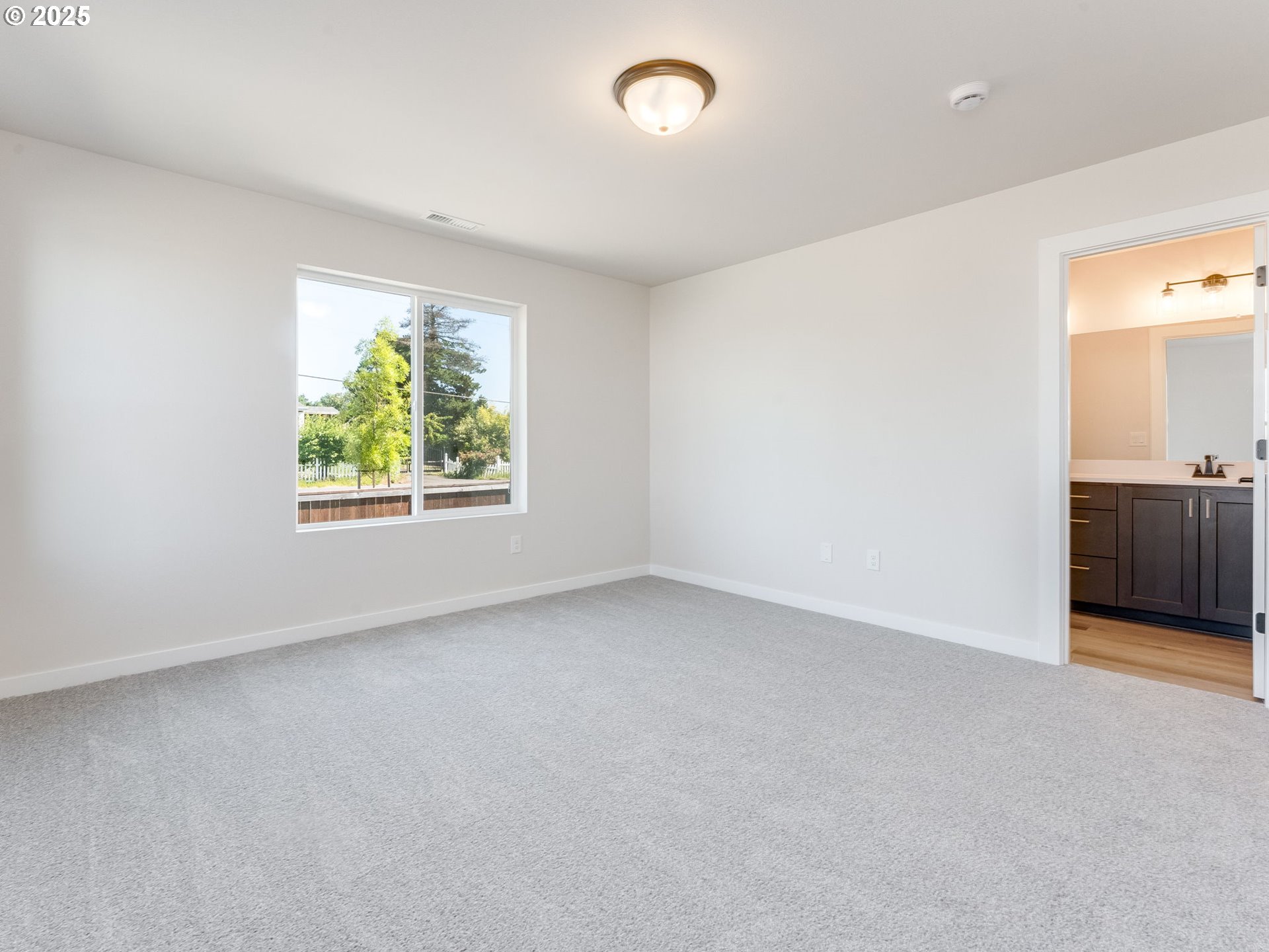 744 Northwest 178th Street Ridgefield, WA 98642 - Photo 21 of 25 an empty room with windows