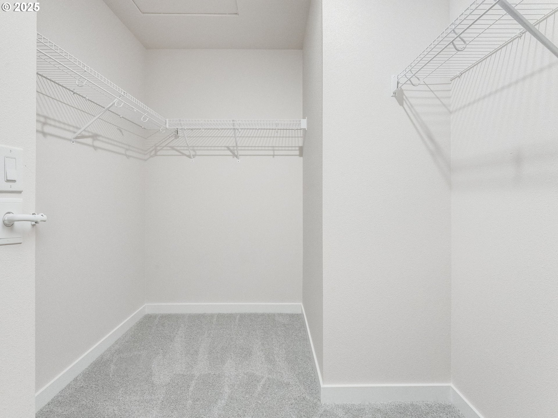 744 Northwest 178th Street Ridgefield, WA 98642 - Photo 23 of 25 a view of a room with racks on the wall