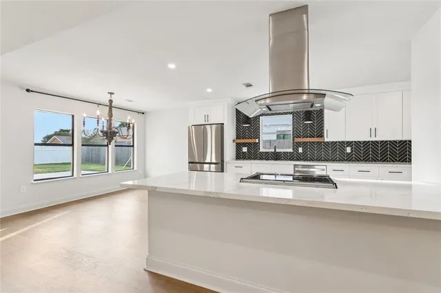 $545,000 | 53 Woodlake Boulevard, Kenner, LA 70065