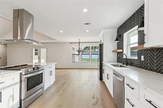 $545,000 | 53 Woodlake Boulevard, Kenner, LA 70065