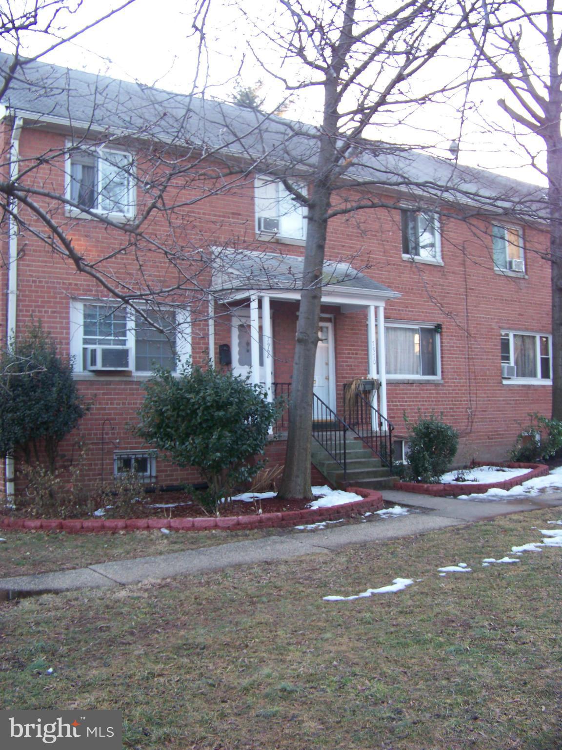 7970 Riggs Road, Unit 7970 Hyattsville, MD 20783 - Photo 1 of 23 a front view of a building with street view