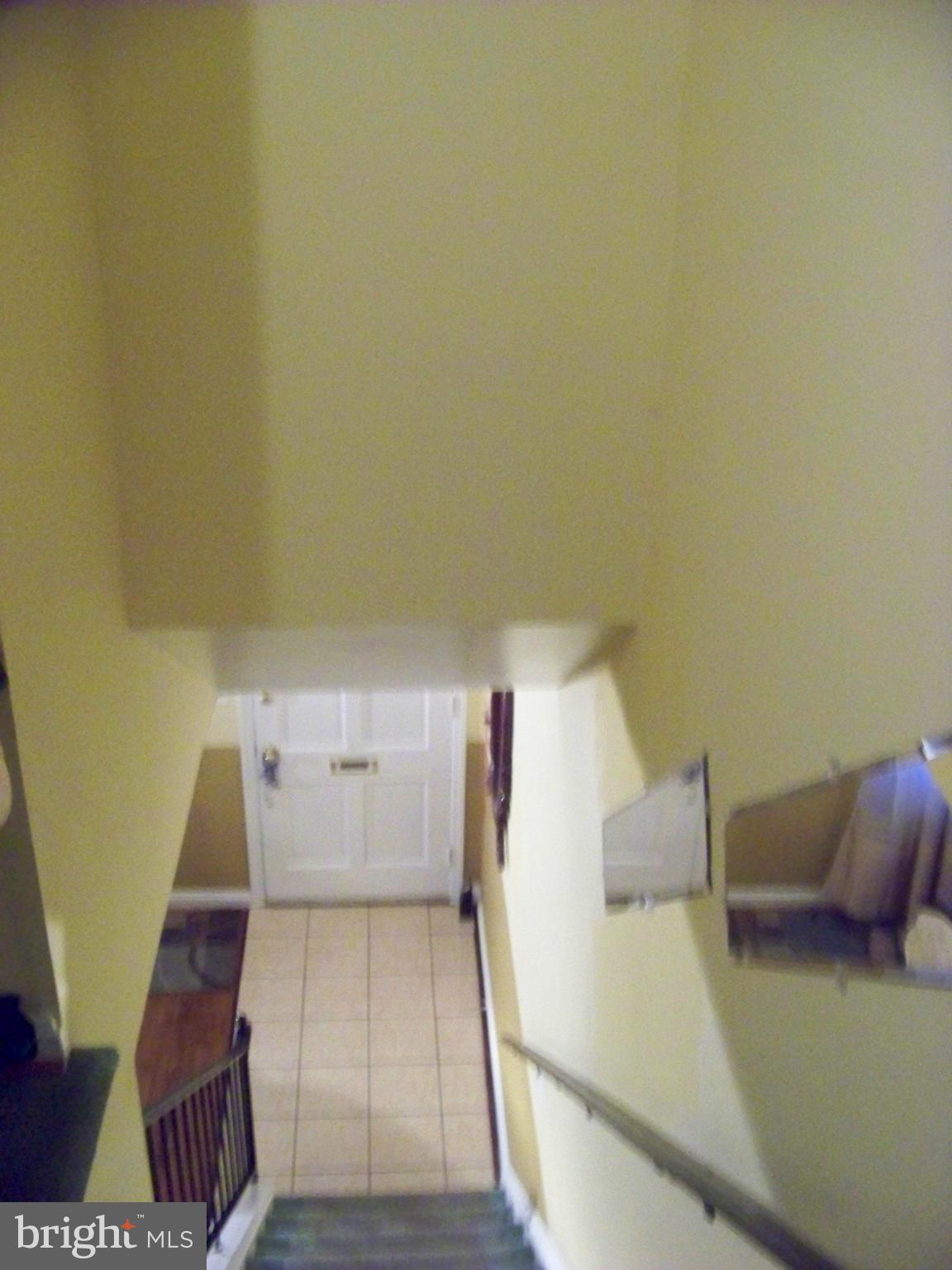7970 Riggs Road, Unit 7970 Hyattsville, MD 20783 - Photo 14 of 23 view of table and chair in wooden floor