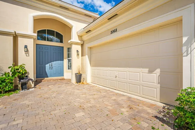 a house view with a backyard space