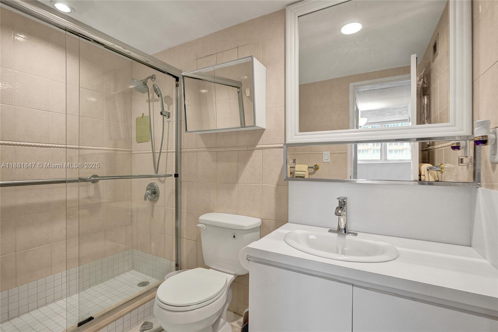 4250 Galt Ocean Drive, Unit 4P Fort Lauderdale, FL 33308 - Photo 15 of 29 a bathroom with a sink a toilet and shower