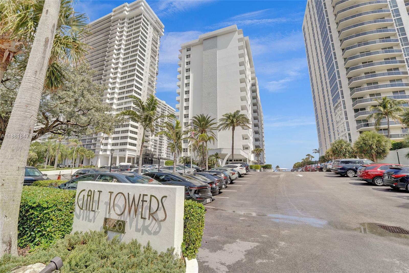 4250 Galt Ocean Drive, Unit 4P Fort Lauderdale, FL 33308 - Photo 19 of 29 a front view of a building with cars parked