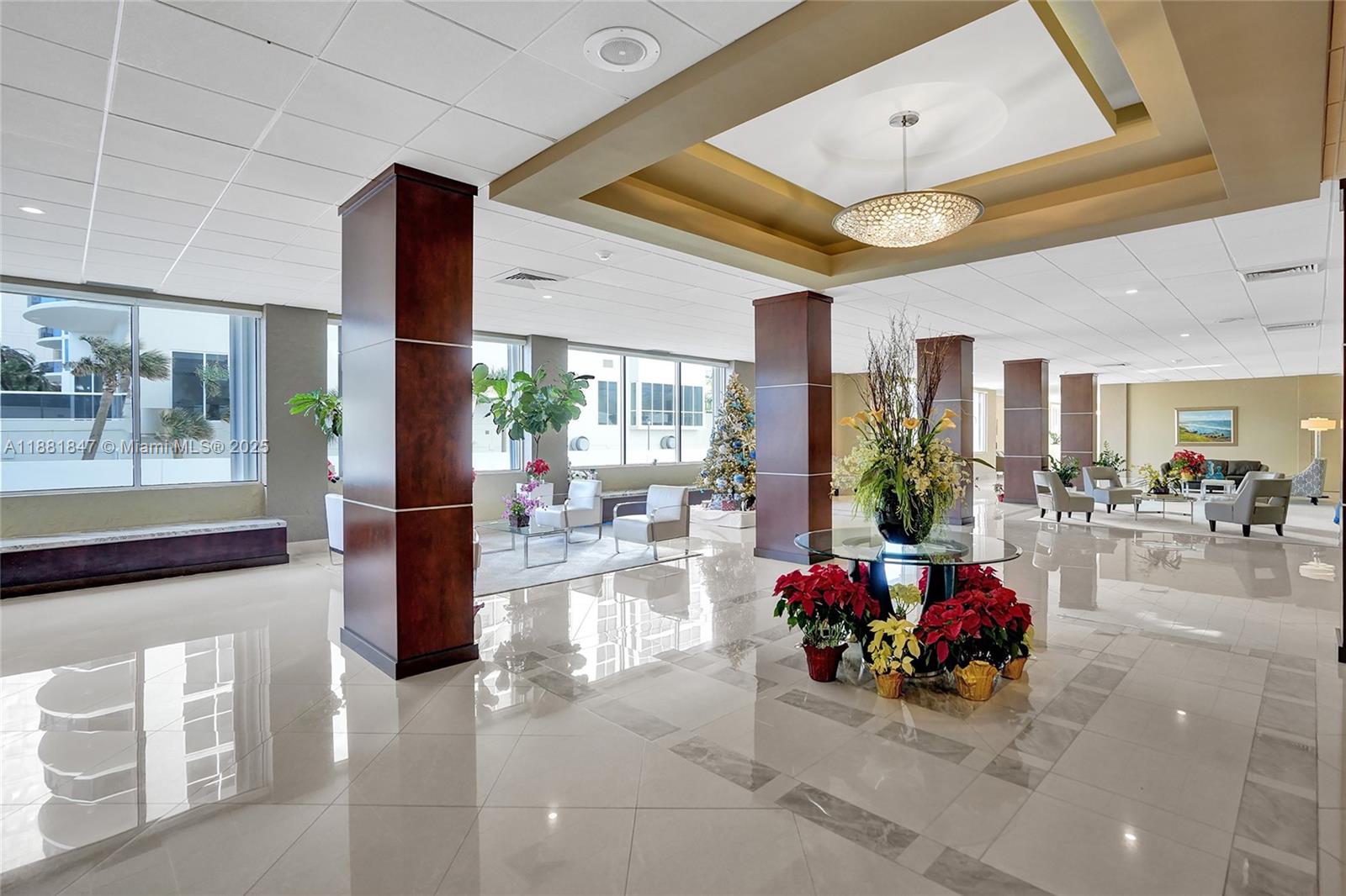 4250 Galt Ocean Drive, Unit 4P Fort Lauderdale, FL 33308 - Photo 22 of 29 a living room with furniture and a large window