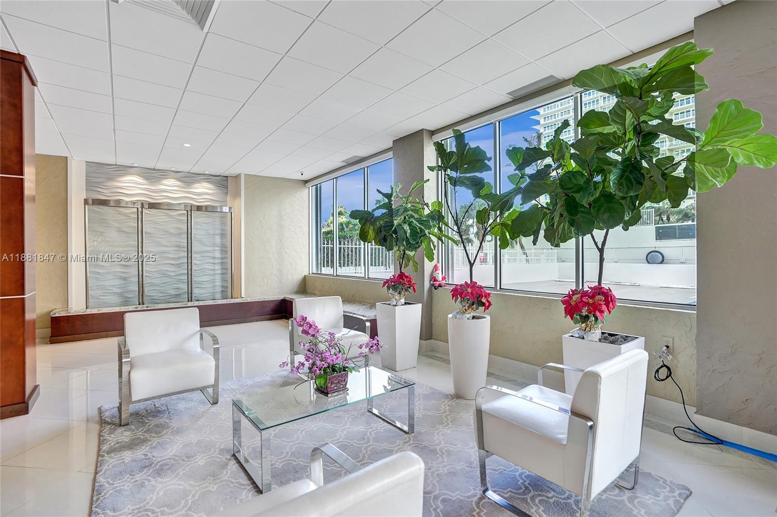 4250 Galt Ocean Drive, Unit 4P Fort Lauderdale, FL 33308 - Photo 23 of 29 a living room with furniture and a potted plant