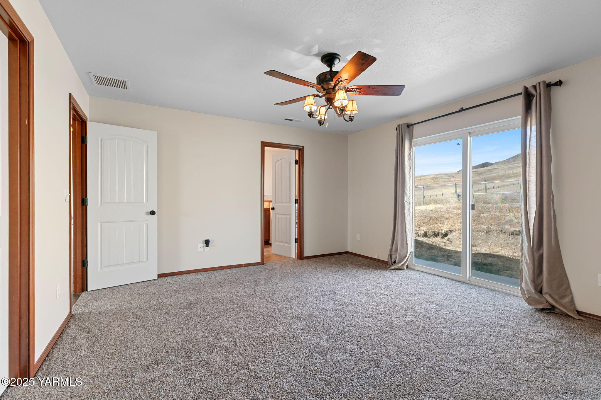 1101 Elk Ridge Lane Selah, WA 98942 - Photo 14 of 28 a view of an empty room with a window