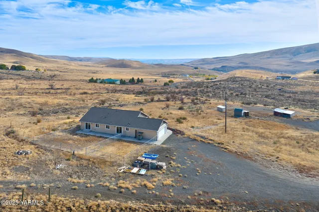 a house with yard in front of it