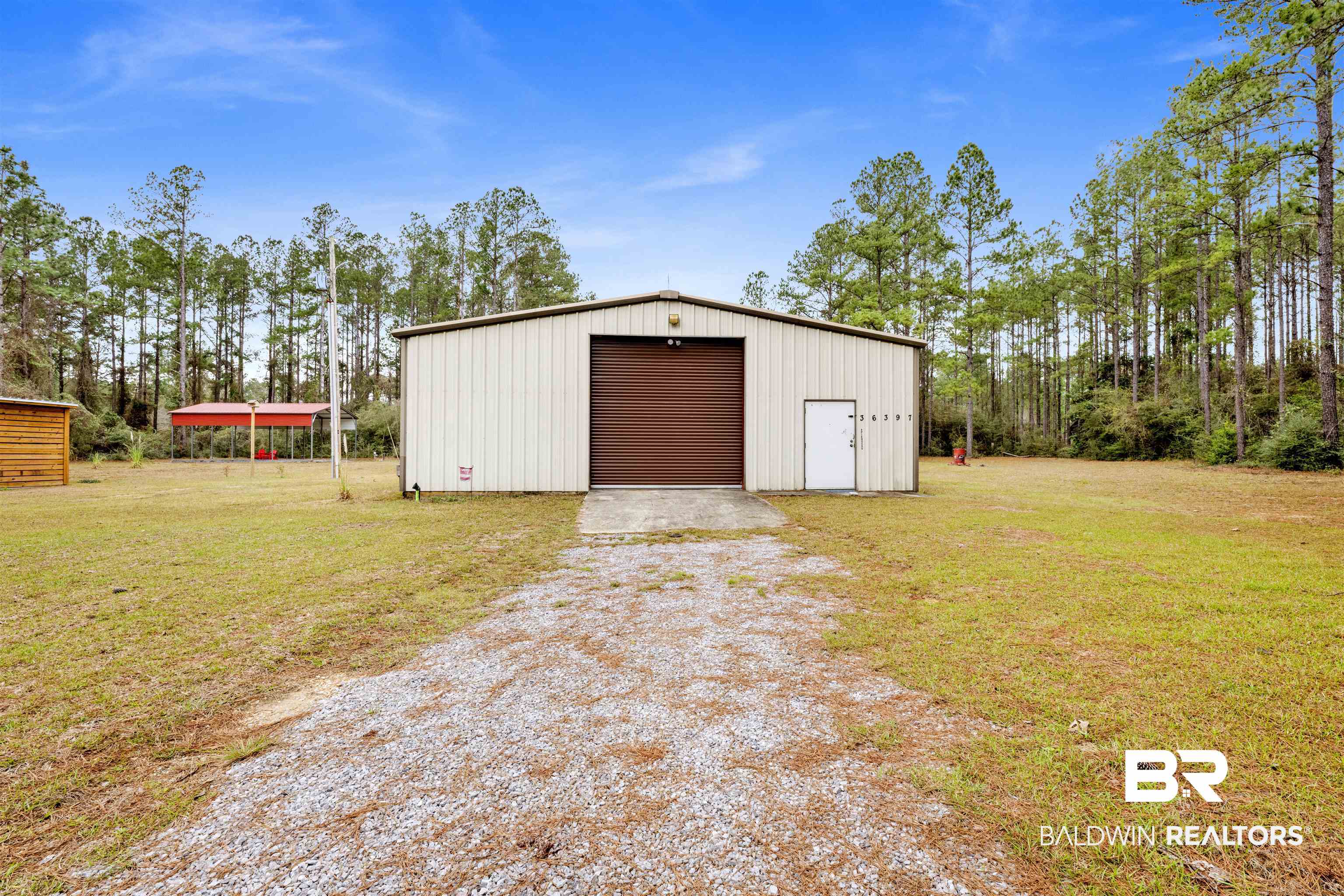 36397 Alexandria Trail Stapleton, AL 36578 - Photo 54 of 65 View of outbuilding featuring driveway