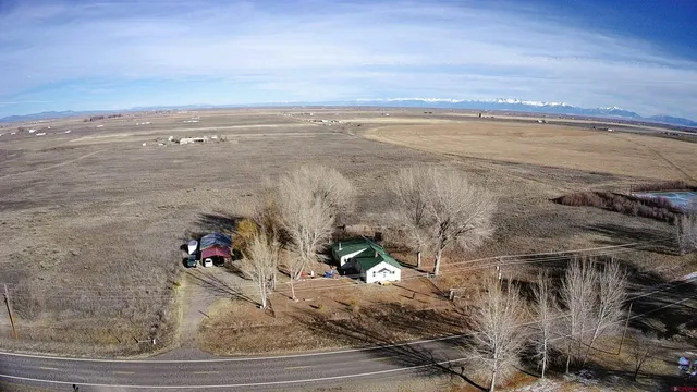a view of an ocean and a mountain