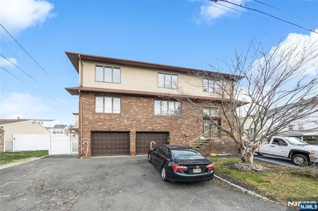 a car parked in front of a house
