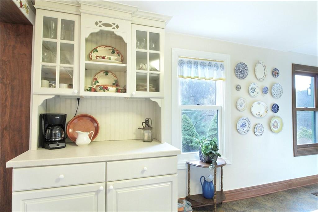 137 Union Church Road Mars, PA 16046 - Photo 9 of 24 a kitchen with a refrigerator and a potted plant