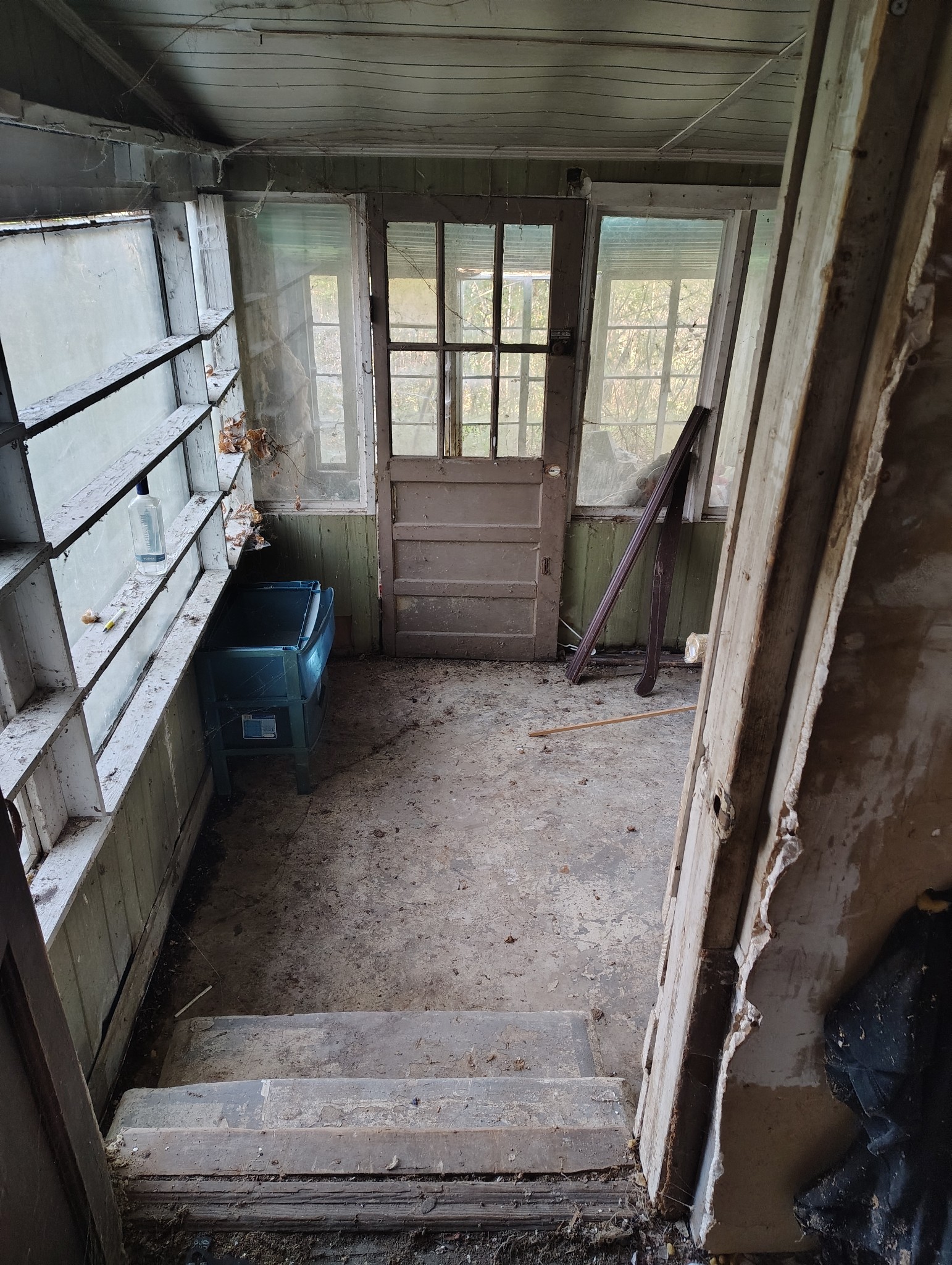 224 Baptist Street Adamsville, TN 38310 - Photo 5 of 5 a view of an empty room with wooden floor and windows
