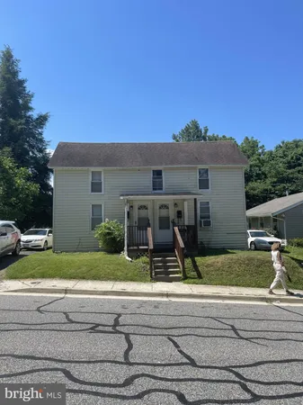 front view of house with a yard