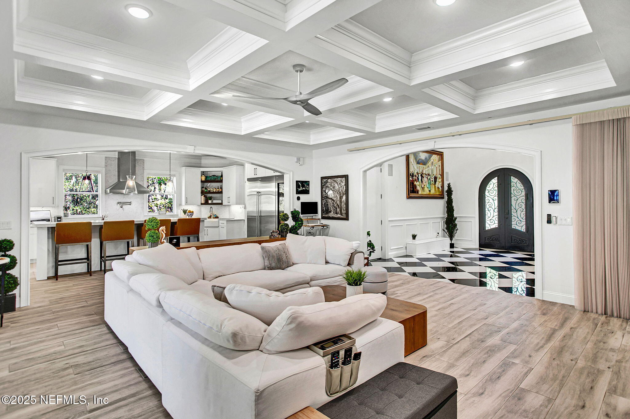 13224 Mandarin Road Jacksonville, FL 32223 - Photo 16 of 36 a living room with furniture kitchen view and a wooden floor