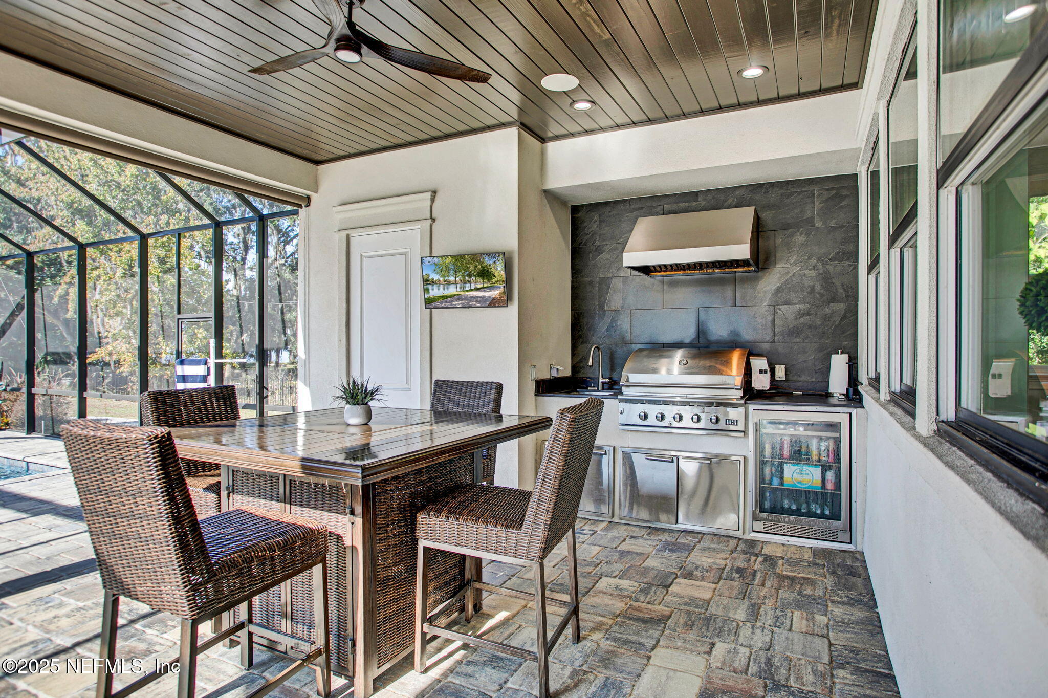 13224 Mandarin Road Jacksonville, FL 32223 - Photo 18 of 36 a kitchen with a stove and white cabinets
