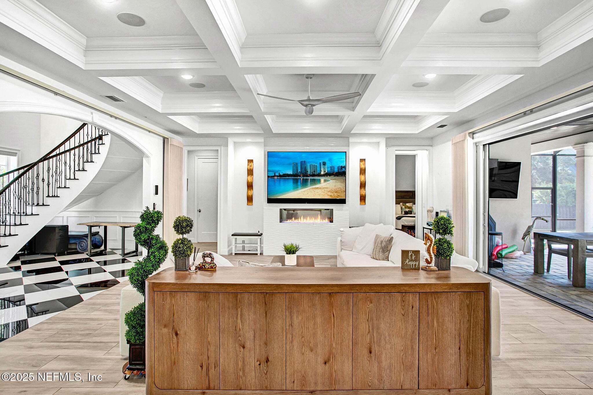 13224 Mandarin Road Jacksonville, FL 32223 - Photo 27 of 36 a living room with furniture and a flat screen tv