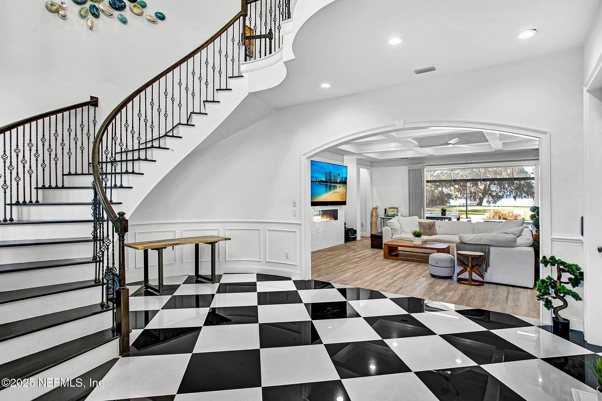 13224 Mandarin Road Jacksonville, FL 32223 - Photo 28 of 36 a room with black white checkered and black white checkered floor