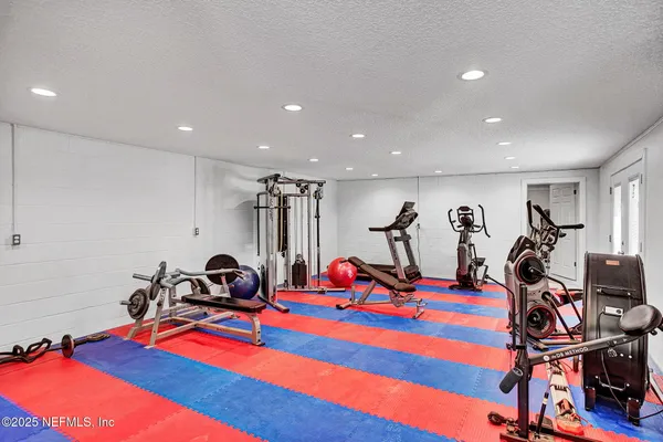 a view of a room with gym equipment