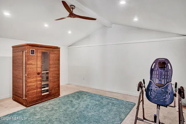 a view of a livingroom with furniture