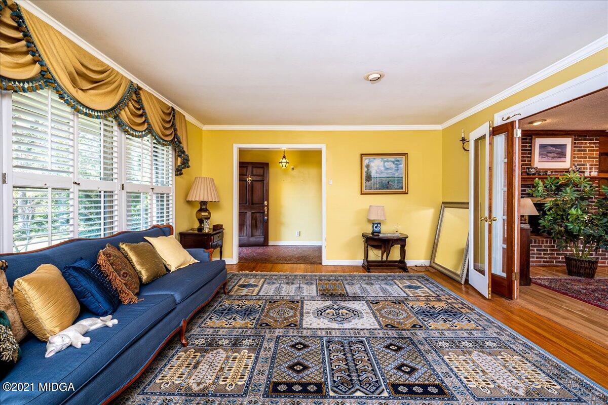 6434 Bevin Drive Macon, GA 31216 - Photo 16 of 28 a living room with furniture and a rug