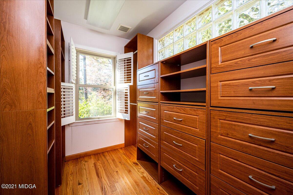 6434 Bevin Drive Macon, GA 31216 - Photo 26 of 28 a view of walk in closet and bedroom