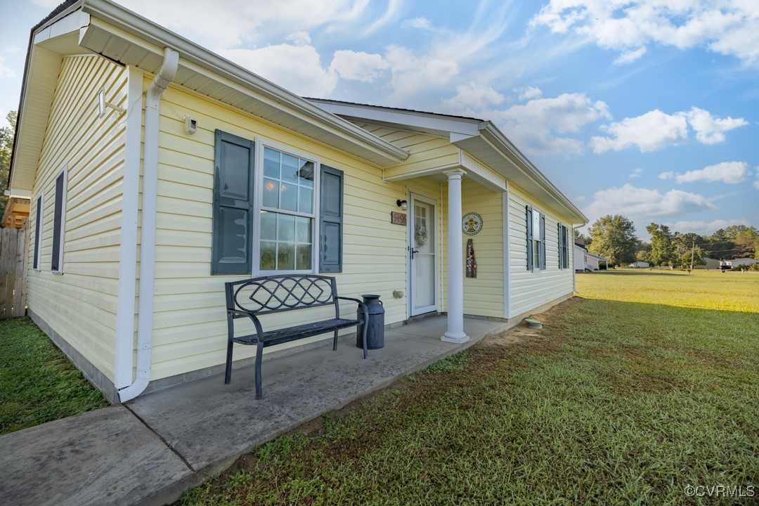 96 Horseshoe Road Jarratt, VA 23867 - Photo 22 of 36 View of front facade with a front lawn
