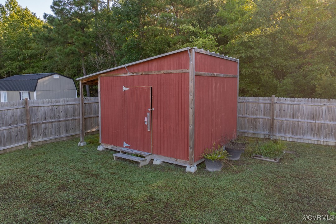 96 Horseshoe Road Jarratt, VA 23867 - Photo 24 of 36 View of outbuilding with a lawn