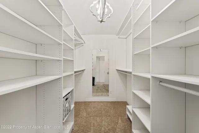 a view of a room with shelves