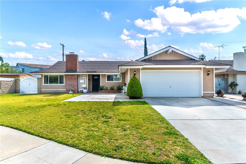 8948 Hope Avenue Riverside, CA 92503 - Photo 1 of 1 a front view of a house with swimming pool