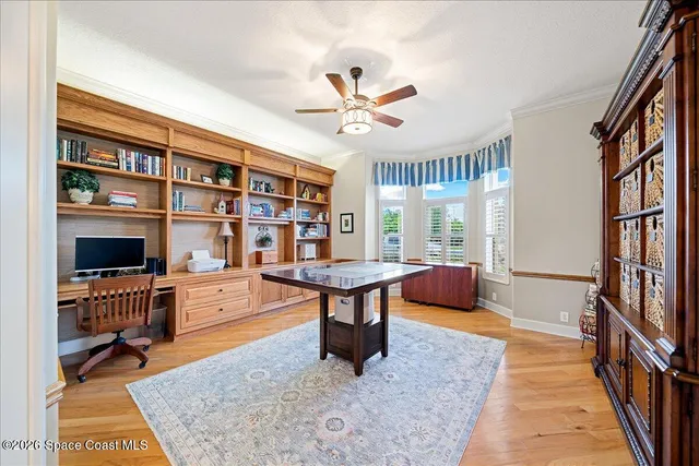 a spacious bathroom with a tub sink and mirror