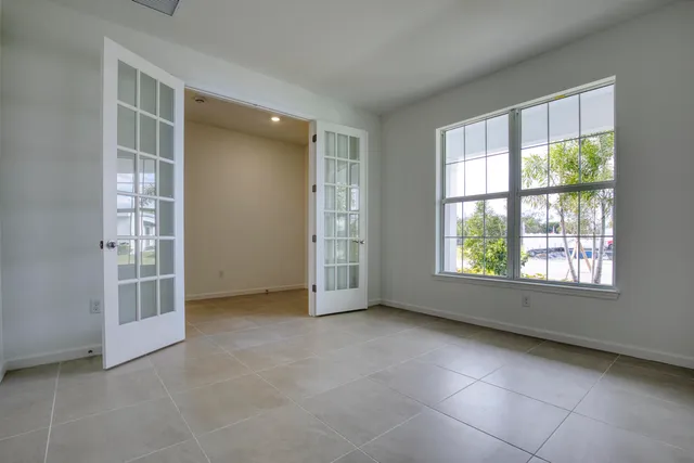 an empty room with a bathroom