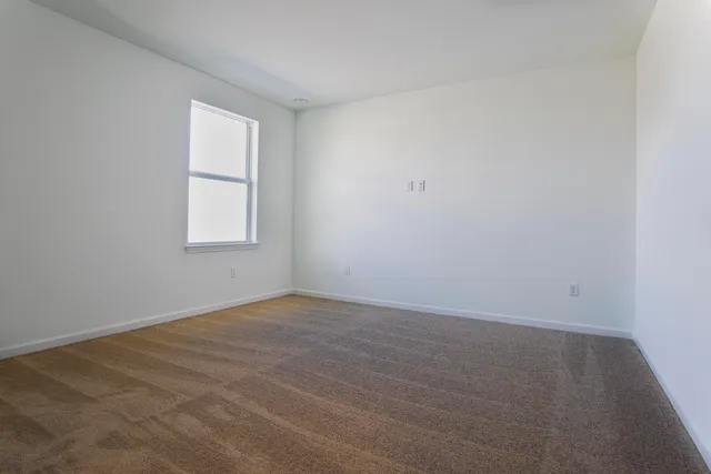an empty room with a window