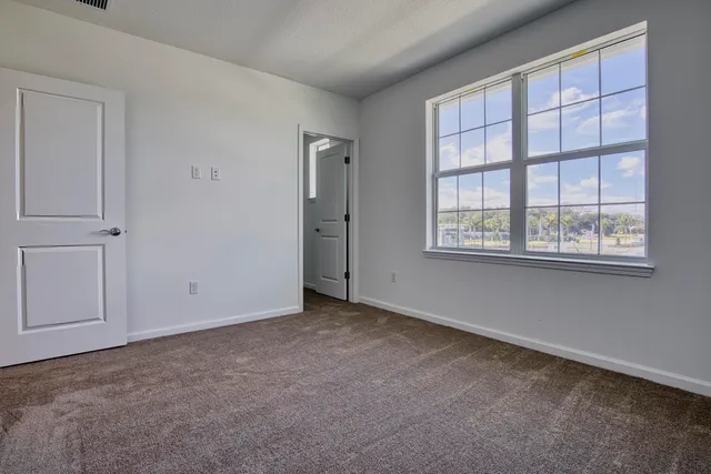 a view of an empty walk in closet