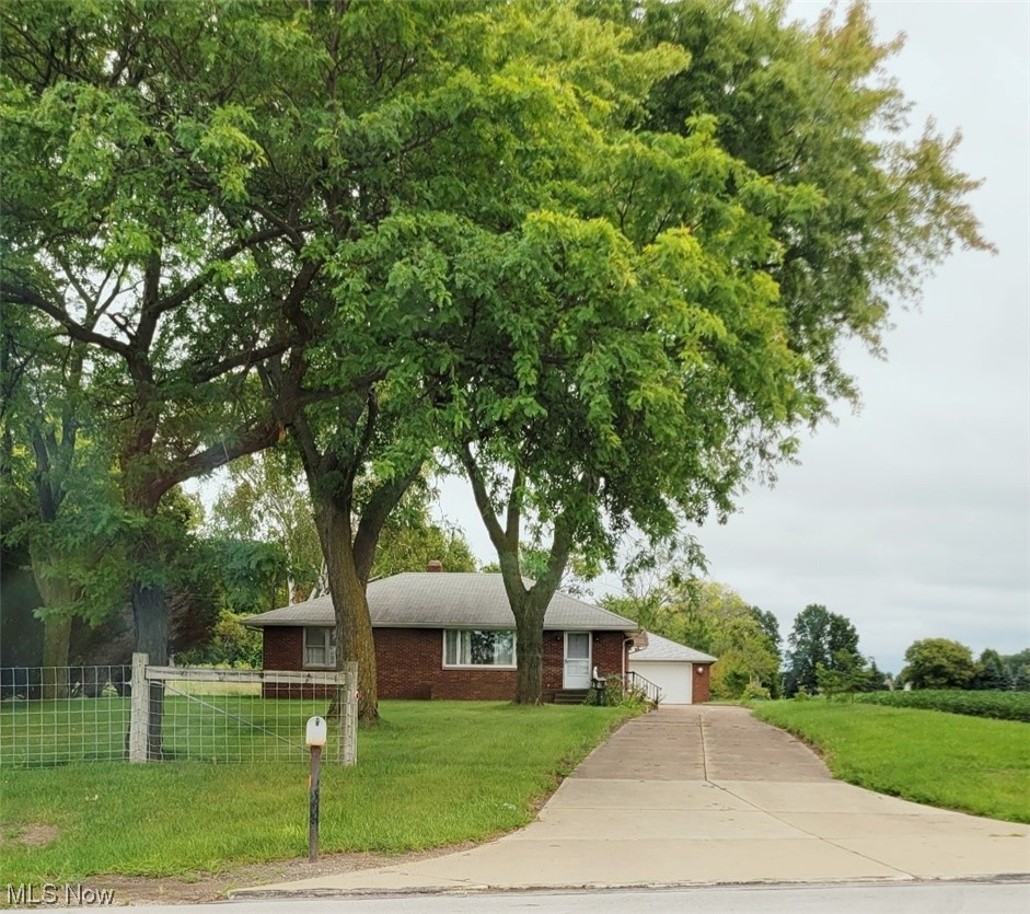6416 Milan Road Sandusky, OH 44870 - Photo 1 of 34 Single story home with a front lawn