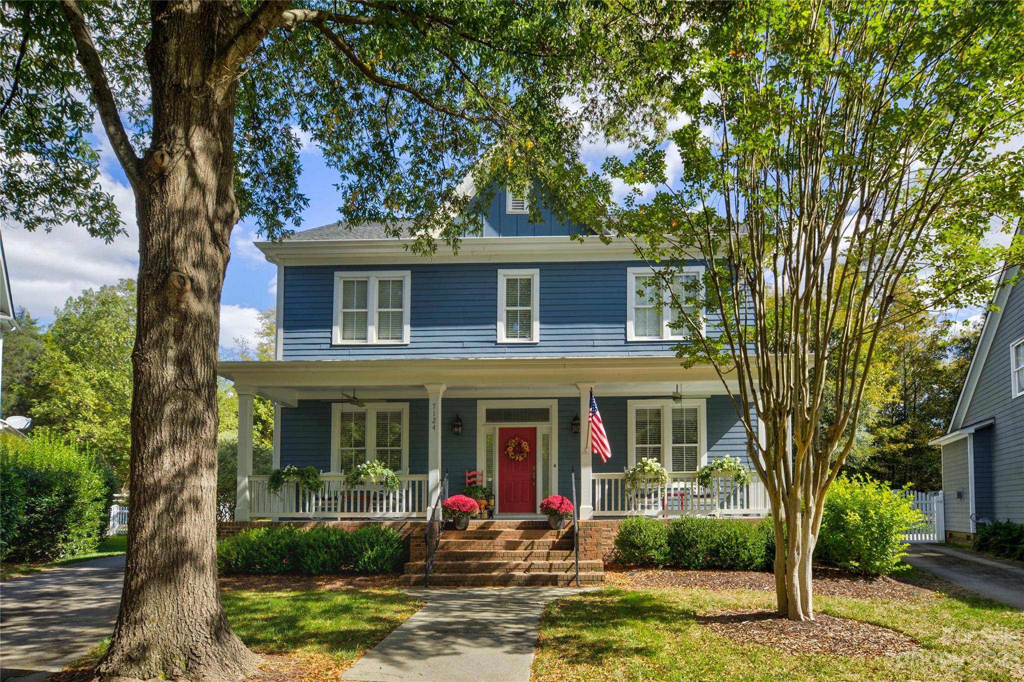 front view of a house with a yard