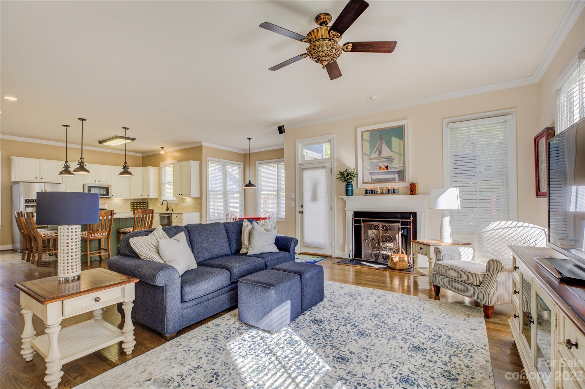 7124 Michael Scott Crossing Fort Mill, SC 29708 - Photo 19 of 48 a living room with furniture and a fireplace