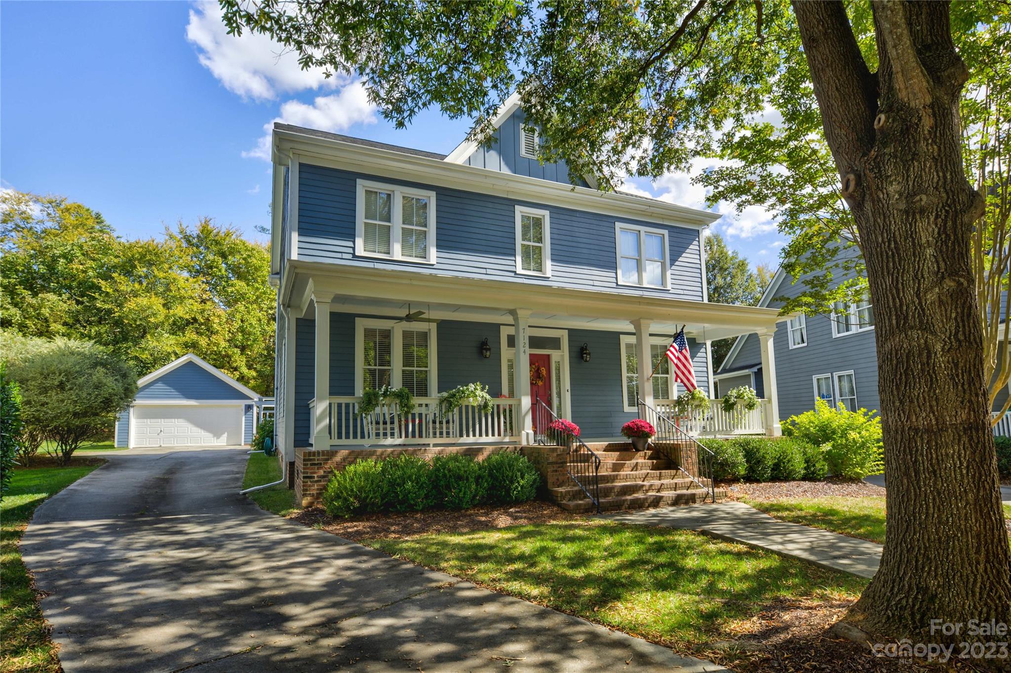 7124 Michael Scott Crossing Fort Mill, SC 29708 - Photo 2 of 48 front view of a house with a yard
