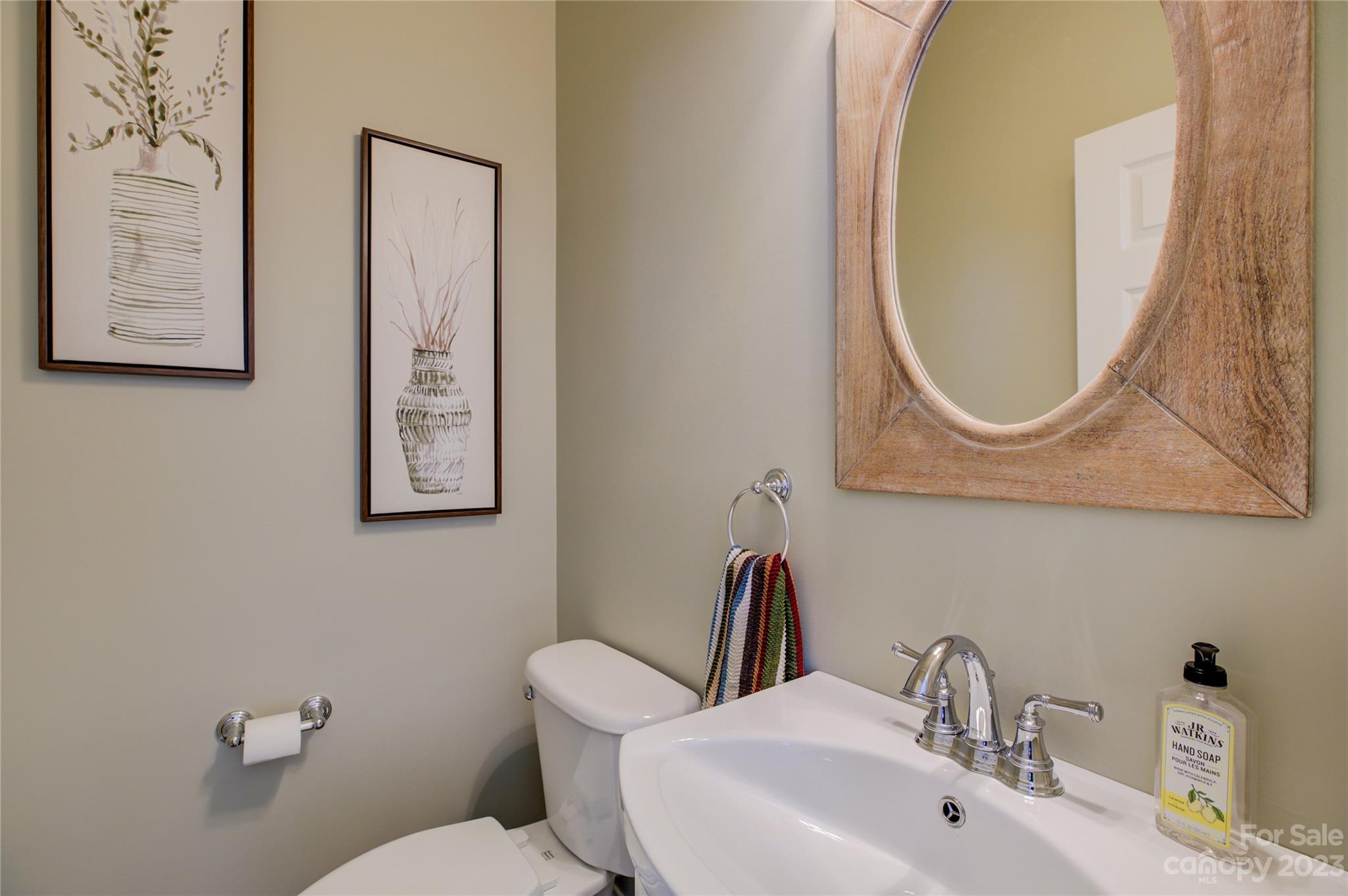 7124 Michael Scott Crossing Fort Mill, SC 29708 - Photo 21 of 48 a bathroom with a toilet sink and mirror