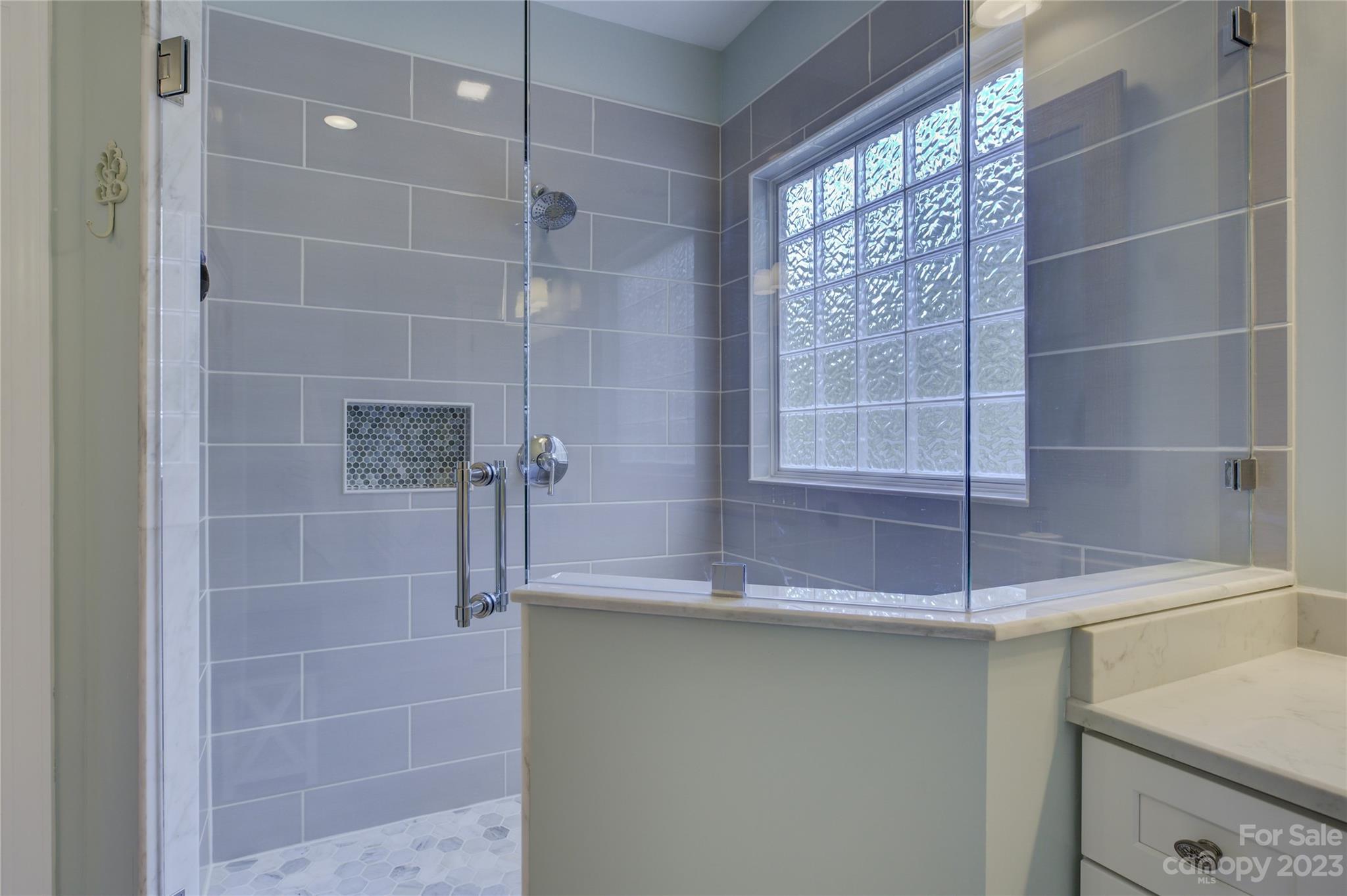 7124 Michael Scott Crossing Fort Mill, SC 29708 - Photo 29 of 48 a bathroom with a sink and a shower