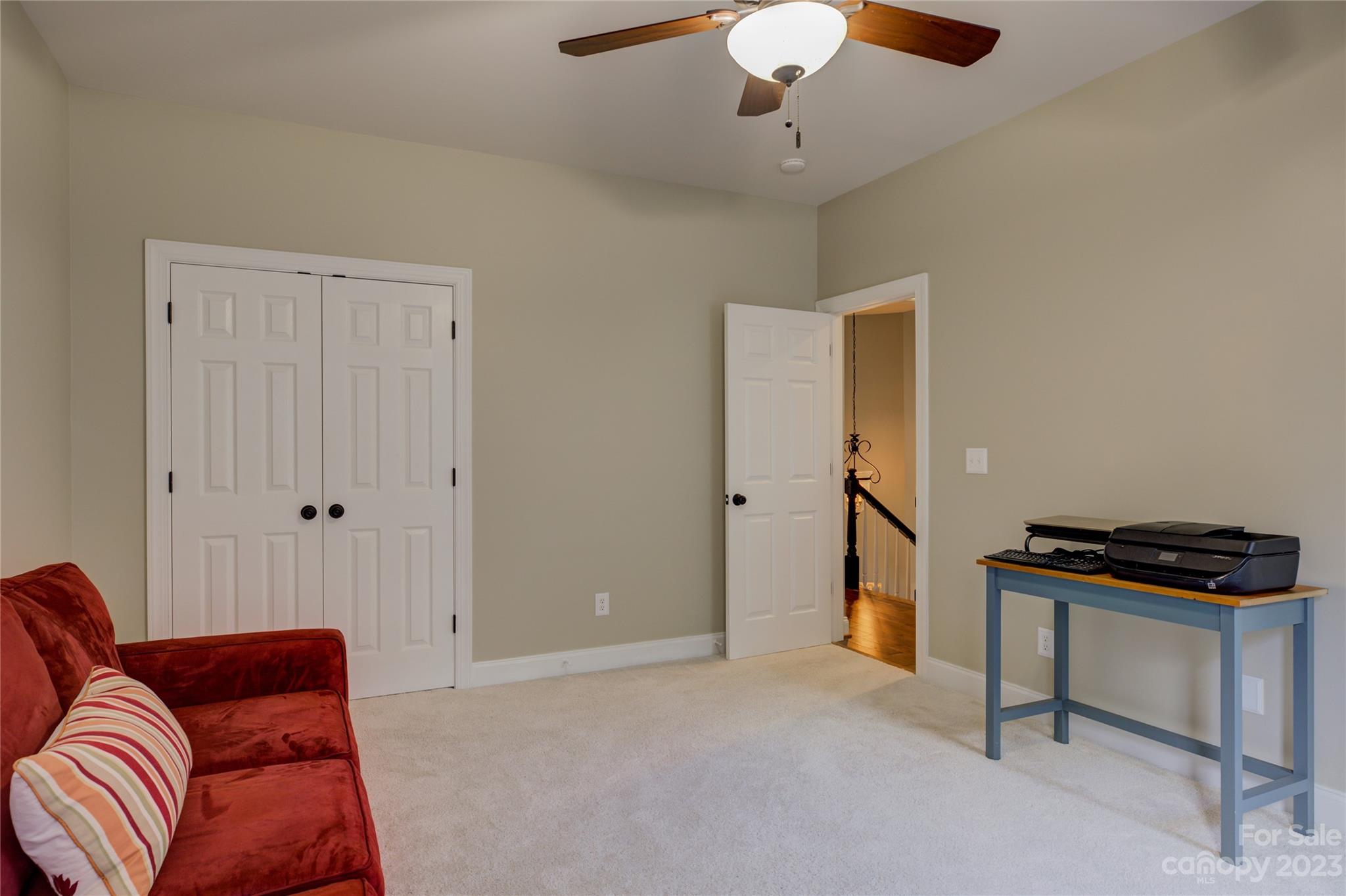 7124 Michael Scott Crossing Fort Mill, SC 29708 - Photo 32 of 48 a livingroom with a ceiling fan