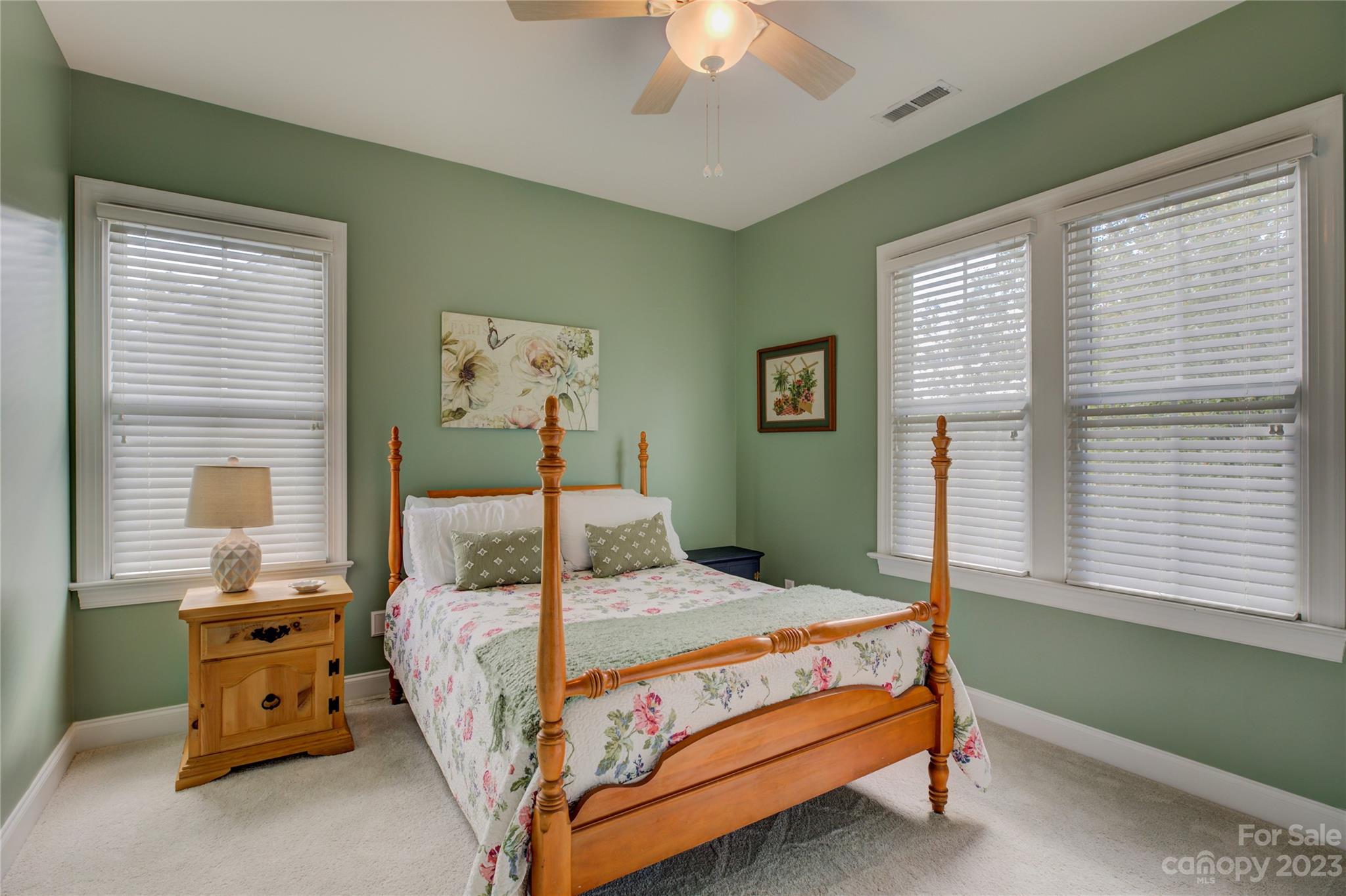 7124 Michael Scott Crossing Fort Mill, SC 29708 - Photo 36 of 48 a bedroom with a bed and a window