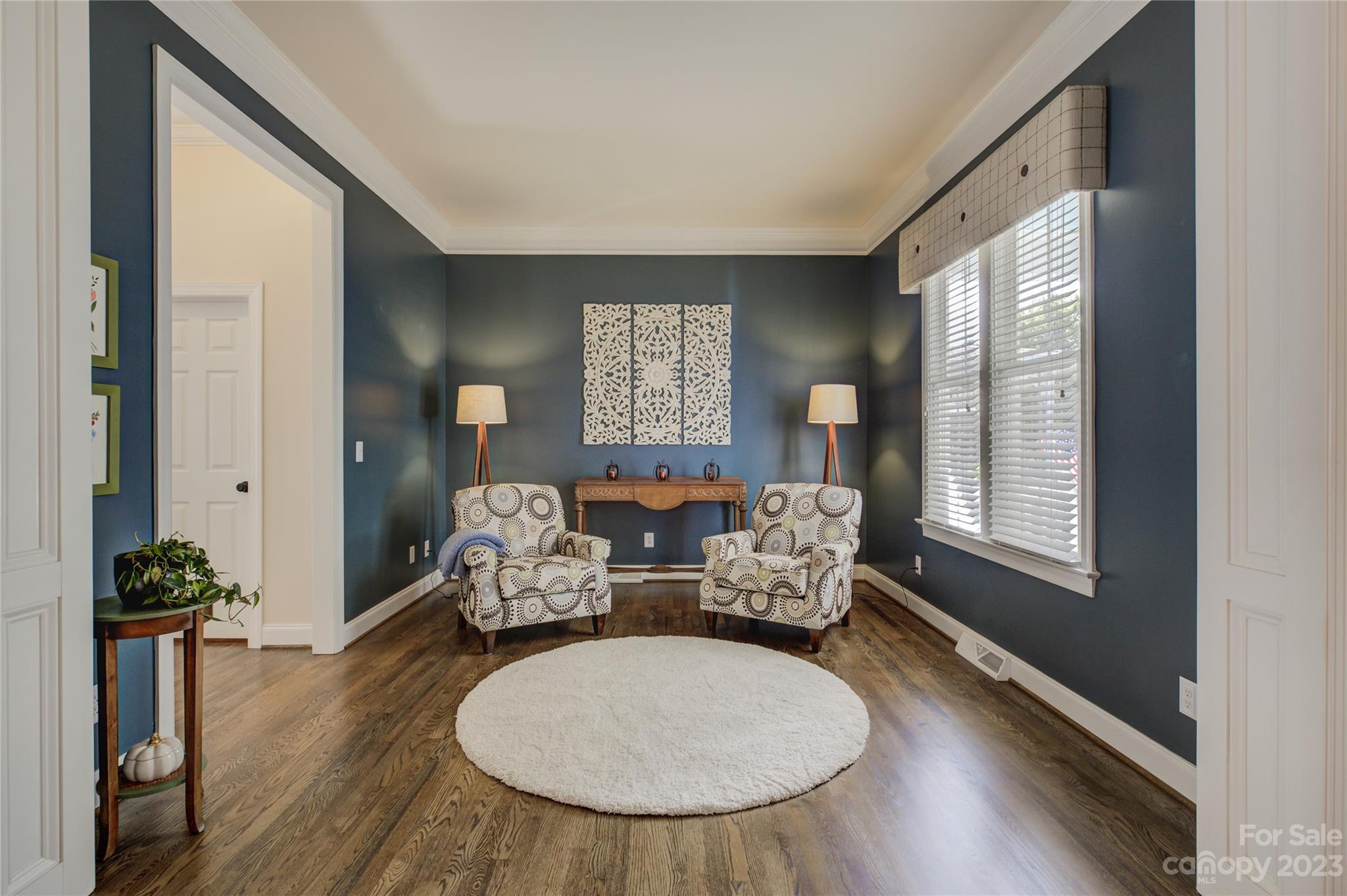 7124 Michael Scott Crossing Fort Mill, SC 29708 - Photo 7 of 48 a living room with furniture and a large window