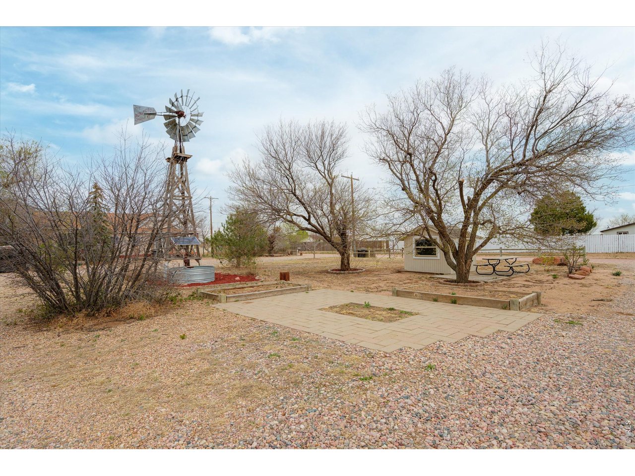 1019 3rd Street Pierce, CO 80650 - Photo 12 of 37 a view of a backyard of a house