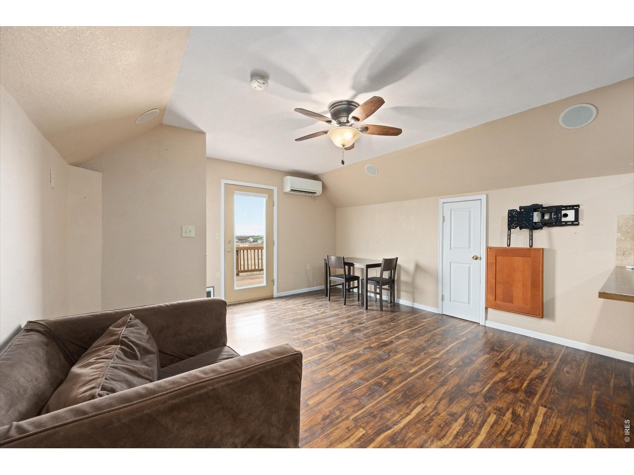 1019 3rd Street Pierce, CO 80650 - Photo 28 of 37 a living room with furniture and a table