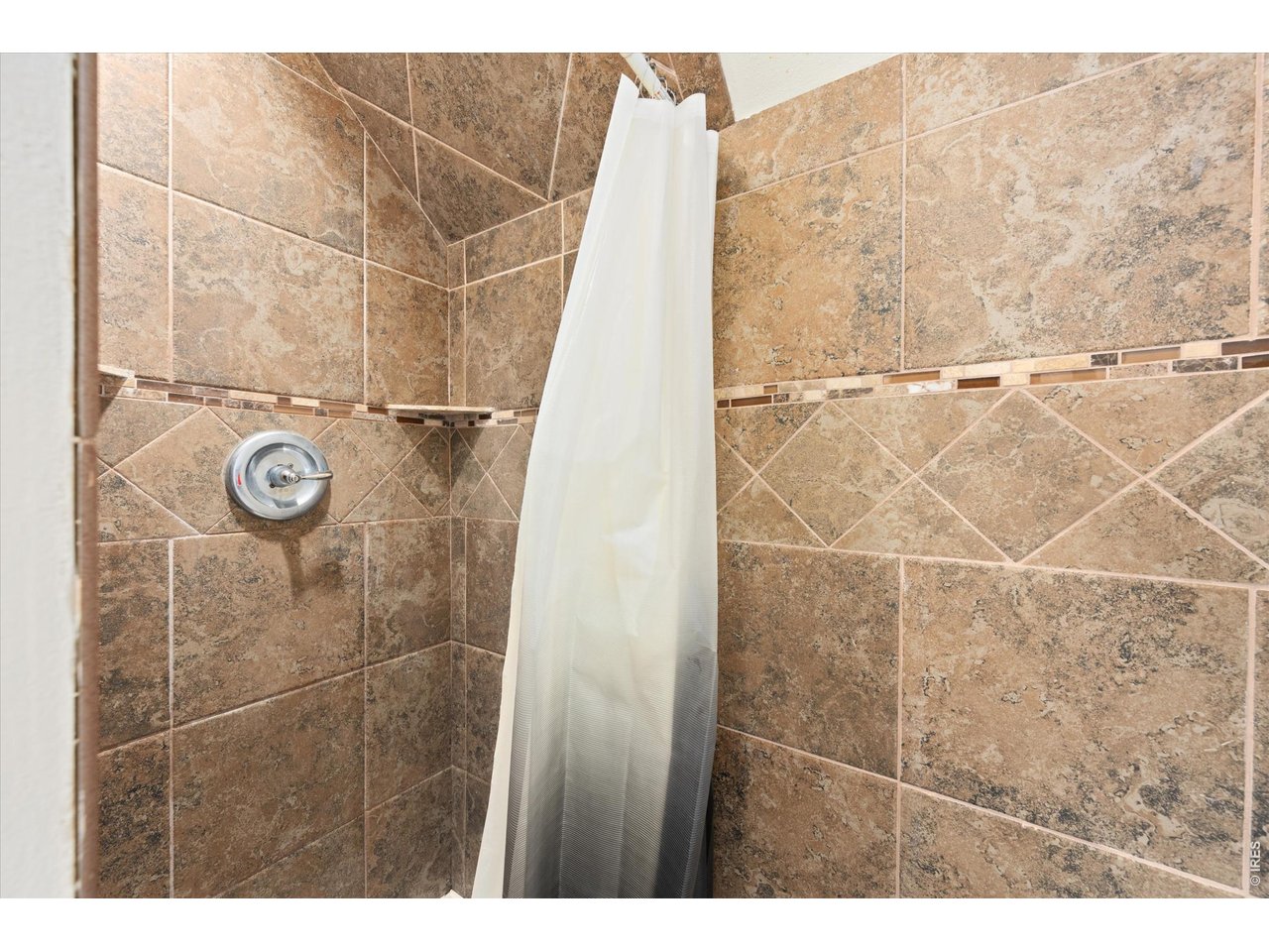 1019 3rd Street Pierce, CO 80650 - Photo 37 of 37 a bathroom with a shower